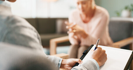 Psychology, therapist and hands or counseling with writing in consultation for mental health support and therapy. Psychologist, patient or expert advice for depression, anxiety or stress on clipboard