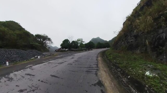 Foggy C&aacute;t B&agrave; Island Hospital Cave road is the largest of the 367 islands in vietnam at the morning. Cat Ba (historically called Cac Ba) Island means "Women&rsquo;s Island" less known tourist attraction.