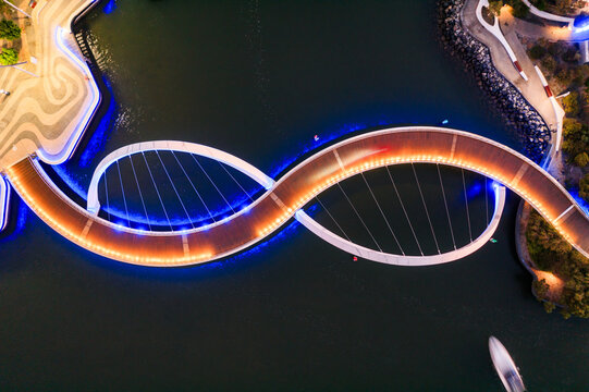 Aerial drone view of Elizabeth Quay Bridge at night, Perth, Australia
