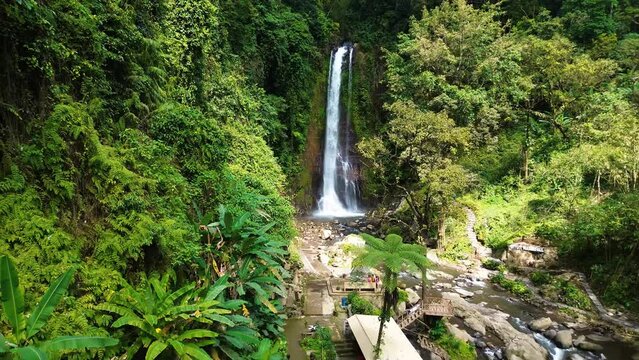 Aerial view of Gitgit waterfall with Balinese gate, Buleleng, Bali, Indonesia