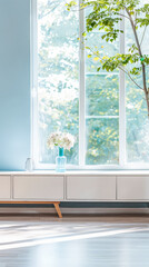Fototapeta premium Elegant modern sideboard next to a window in a room bathed with natural lighting. Home interior composition.