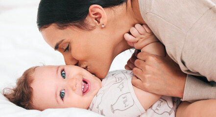 Woman, baby portrait and love kiss in home with hug for support, growth and development with care. Mama, boy child and smile with embrace on bed for mothers day for relationship bonding and happiness