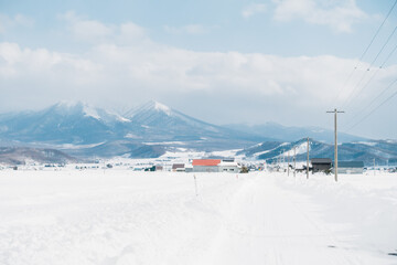 A snow-covered country road in Biei, Hokkaido