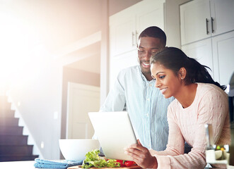 Couple, tablet and cooking with online ingredients on the kitchen, recipe and vegetables. Woman,...
