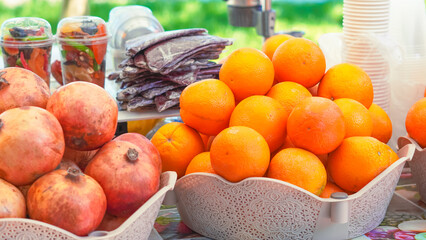 Juicy fruits and berries in plastic cups, perfect for a hot day refreshment