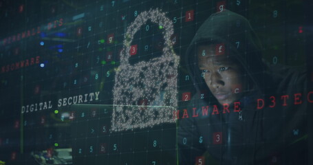 Image of data processing and shield with padlock over african american male hacker using laptop