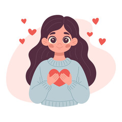 Young woman lovingly embracing a red heart. Positive body and mental health concept. Holding heart to chest