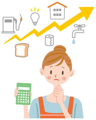 家計について考える主婦　物価高　計算機を持つ
