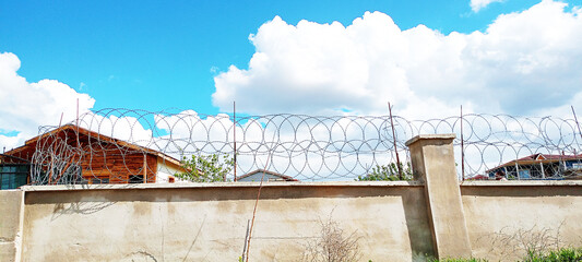 Fototapeta premium Steel barbwire seamless pattern fence. Border from old barbed metal barrier wire