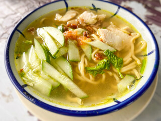 Soto ayam or chicken noodle soup, Malaysian popular cuisine.