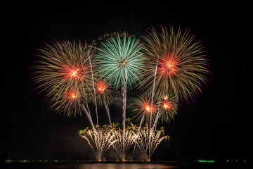 PATTAYA, CHONBURI, THAILAND, Fireworks at Pattaya bay, Pattaya national Fireworks Festival contest, November of every Year, Beautiful of bright light fireworks Show in middle sea, for postcard