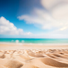 A sandy beach with waves lapping at the shore, under a bright blue sky with fluffy white clouds