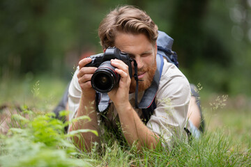 Fototapeta premium closeup portrait of a young man taking a picture
