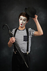 mime greeting in a hat