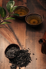 Asian tea concept, two cups of tea and a teapot.