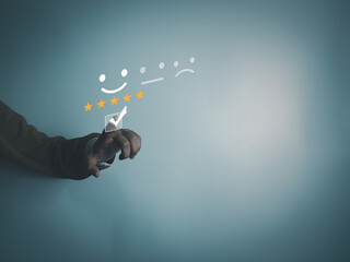 Satisfaction service of customer by smartphone, caring and paying attention to service user, satisfy smile icon, giving the highest rating, very good response and feedback from client