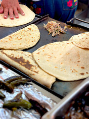 Machaca Tacos  - Traditional Northern Mexican Dish made with Dried Meat (beef or pork) and Served on Tortillas with Eggs, Onions, Cilantro, Lime and Beans.