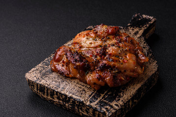 Delicious juicy chicken steak with salt, spices and herbs