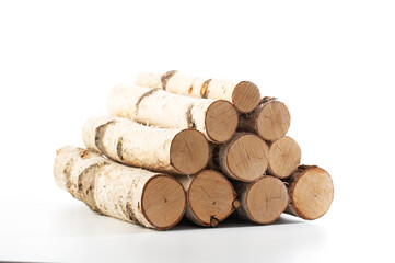 Stack of birch firewood on a white background isolate. Material for lighting a fire, close-up