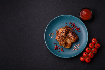 Delicious juicy chicken steak with salt, spices and herbs