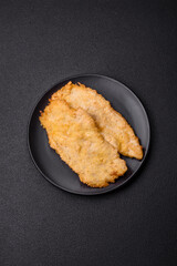Delicious juicy chicken chops in batter with salt, spices and herbs