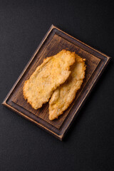 Delicious juicy chicken chops in batter with salt, spices and herbs