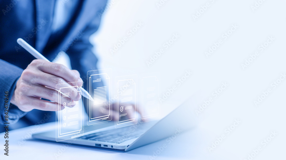 Poster manages document data on a laptop, business paperless. erp, enterprise resource planning system. sof