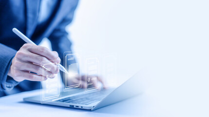 manages document data on a laptop, business paperless. ERP, enterprise resource planning system....