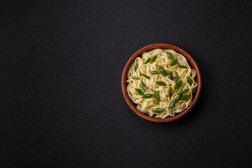 Delicious Asian cuisine dish with rice noodles, peppers, mushrooms and spices