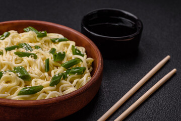 Delicious Asian cuisine dish with rice noodles, peppers, mushrooms and spices
