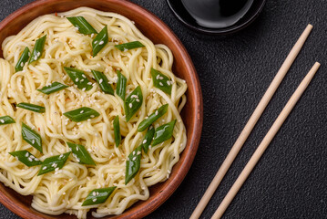 Delicious Asian cuisine dish with rice noodles, peppers, mushrooms and spices
