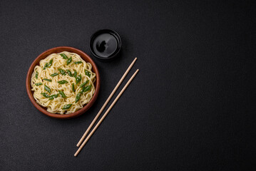 Delicious Asian cuisine dish with rice noodles, peppers, mushrooms and spices