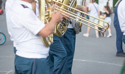 Police force officers with a musical instruments in the city.