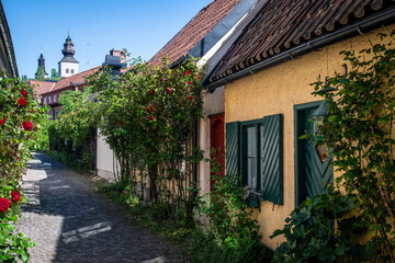 Narrow street in the historical old town in Visby, Sweden