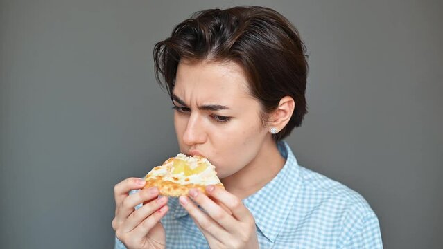 Spoiled junk food, woman eating pizza and suffering from gag reflex