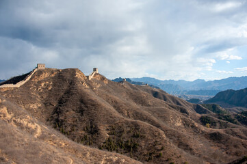 Great Wall of China at Jinshanling. The UNESCO World Heritage site stretches out across the horizon showing this stunning landscape