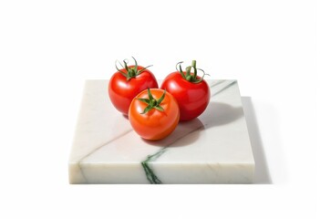 three tomatoes sitting on top of a marble cutting board