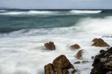 Long-exposure view of the surf on the beach 