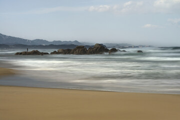Long-exposure view of the surf on the beach 