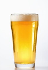 a glass of beer sitting on top of a table