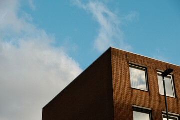 Building touching blue sky