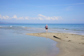 Beach walk along the lagoon on the beach of Nei Pori, Olympic Riviera - Greece