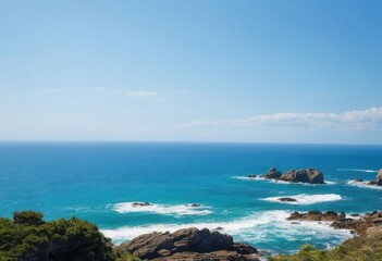 Fototapeta premium a view of the ocean from the top of a hill