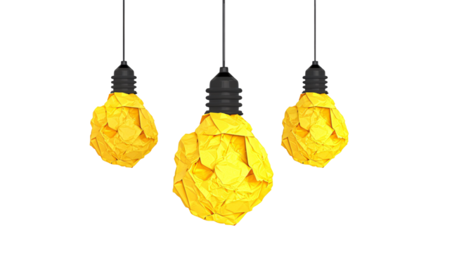 a group of yellow paper balls from a black light bulb