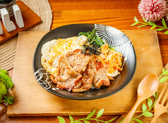 Pastoral BBQ rice served in dish isolated on wooden table side view of taiwan food