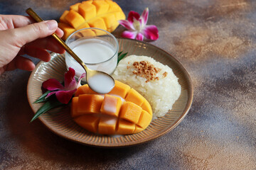 Mango sticky rice, famous Thai dessert for the summer season