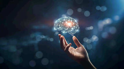 A hand holding a brain with a red light on it. Concept of intelligence and the importance of the brain