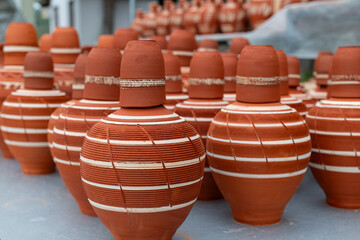 Traditional decorative handmade water pots. Ceramic pottery sales market Pottery is the ceramic and...