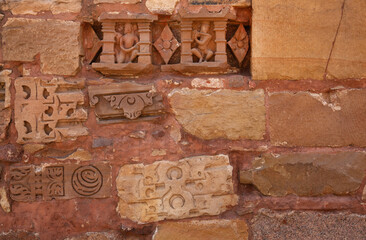 Sculptures and designs on the wall of Varaha Temple in the Khajuraho temple complex, India