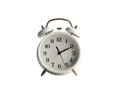a white alarm clock with bells